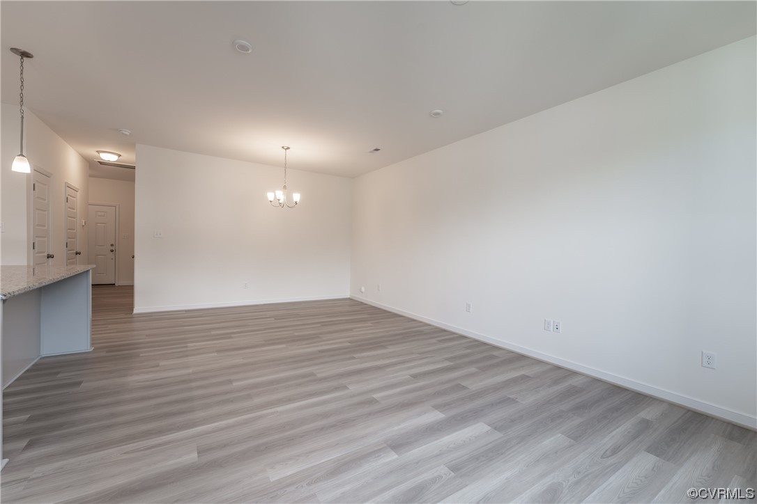18609 Palisades Ridge Moseley, VA 23120 - Photo 10 of 50 a view of empty room with wooden floor