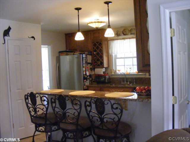 5810 Bethlehem Road Richmond, VA 23230 - Photo 6 of 12 Kitchen - Kitchen has granite counter tops, cerami