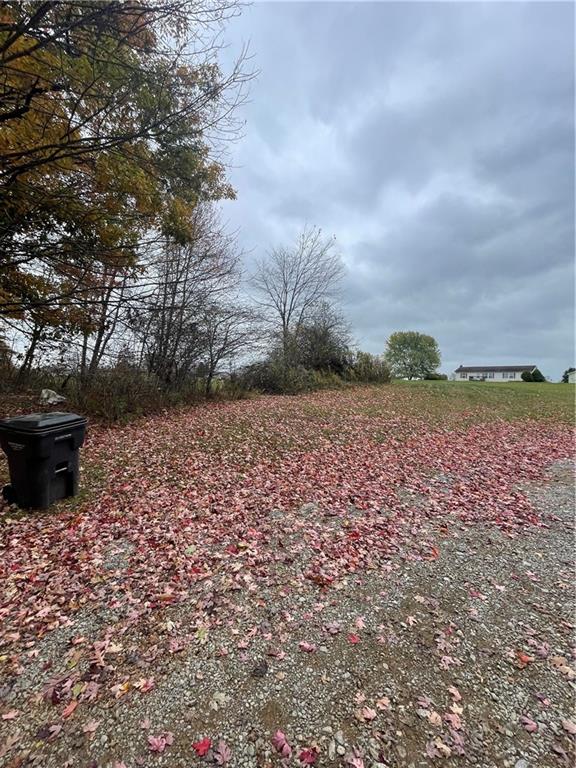 0 Browntown Road Harrisville, PA 16038 - Photo 2 of 6 a view of a yard with wooden fence