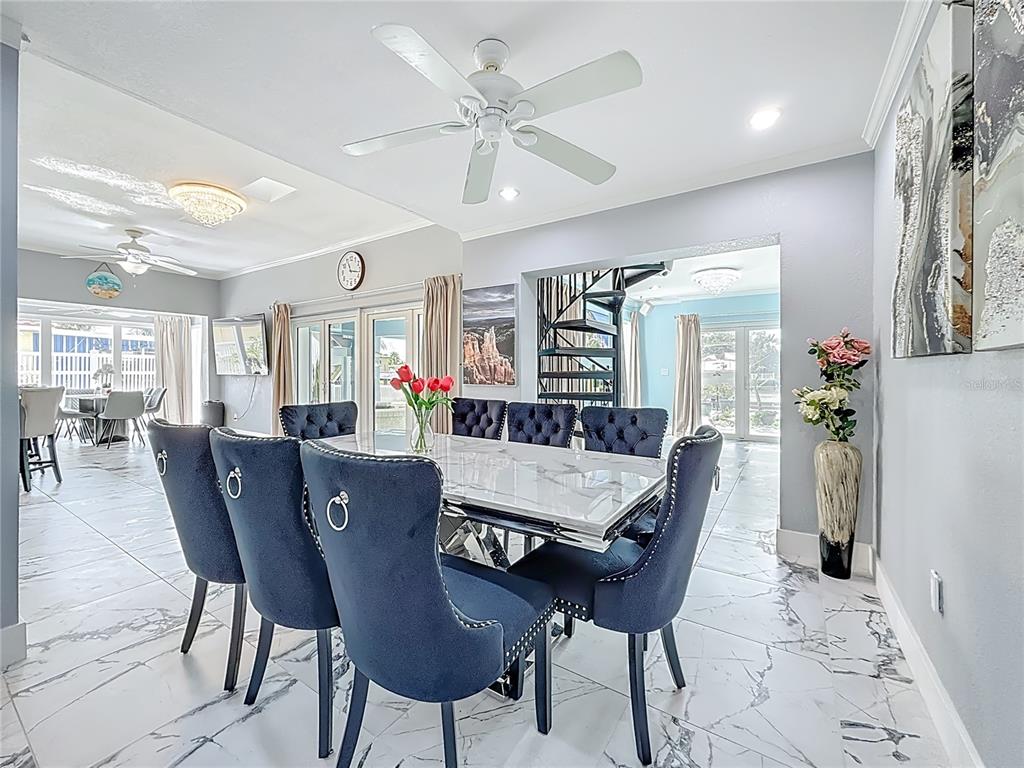 14186 West Parsley Drive Madeira Beach, FL 33708 - Photo 14 of 57 a dining room with furniture and window