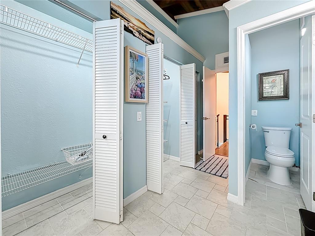 14186 West Parsley Drive Madeira Beach, FL 33708 - Photo 30 of 57 a bathroom with a toilet and a shower