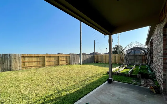 a bathroom with swimming pool table and chairs