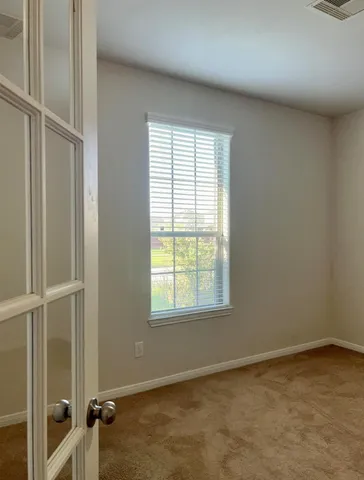 an empty room with a window