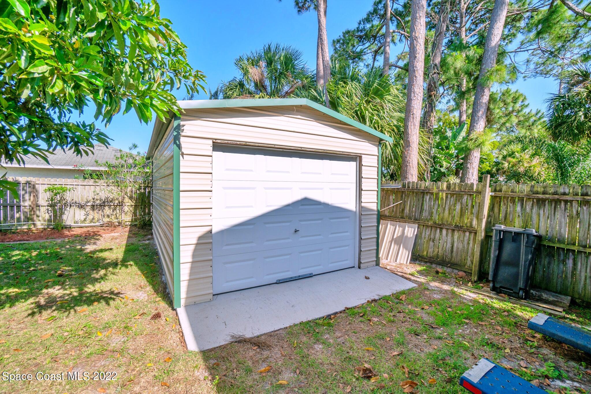 5449 Flint Road Cocoa, FL 32927 - Photo 34 of 36 a view of backyard with green space