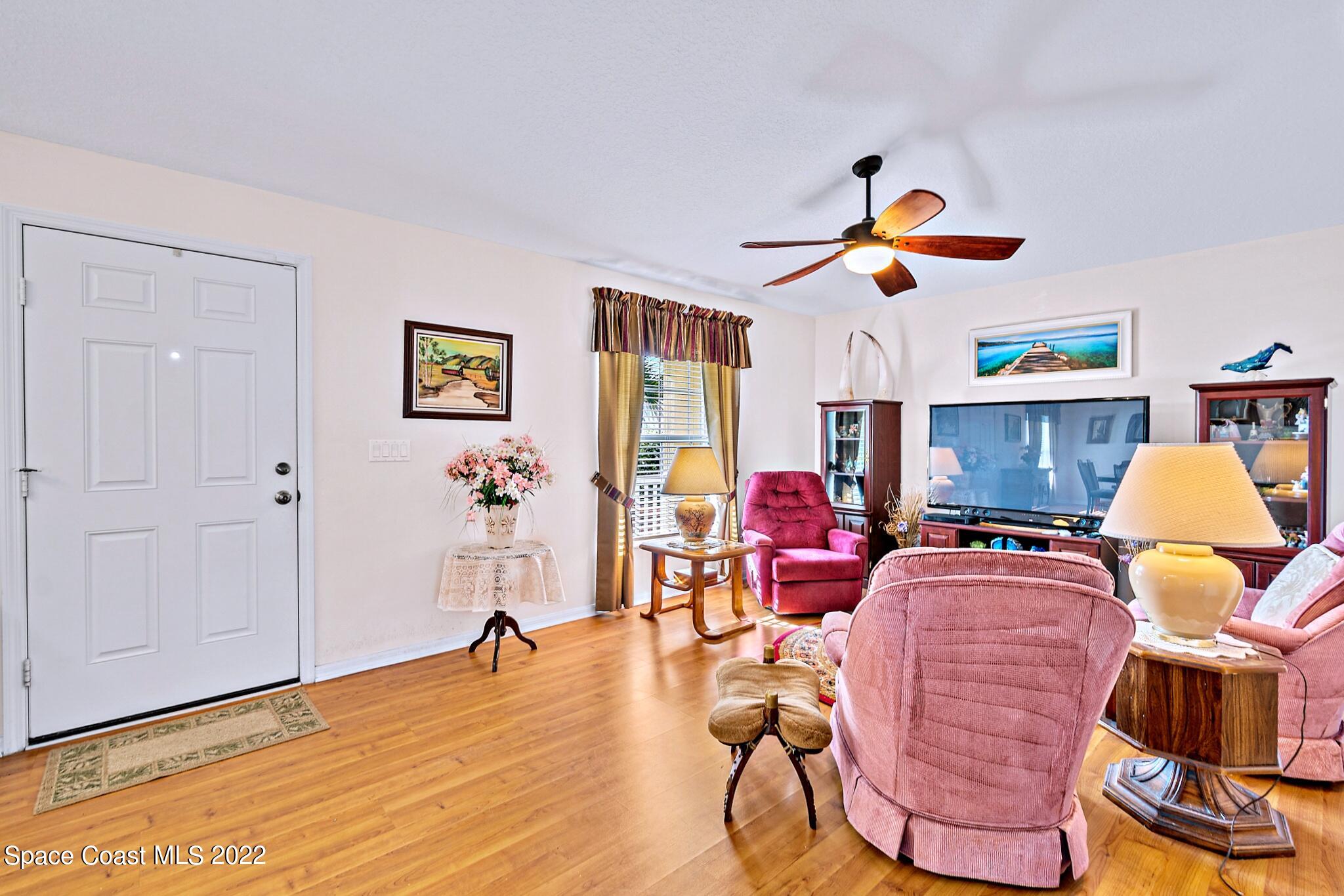 5449 Flint Road Cocoa, FL 32927 - Photo 9 of 36 a living room with furniture