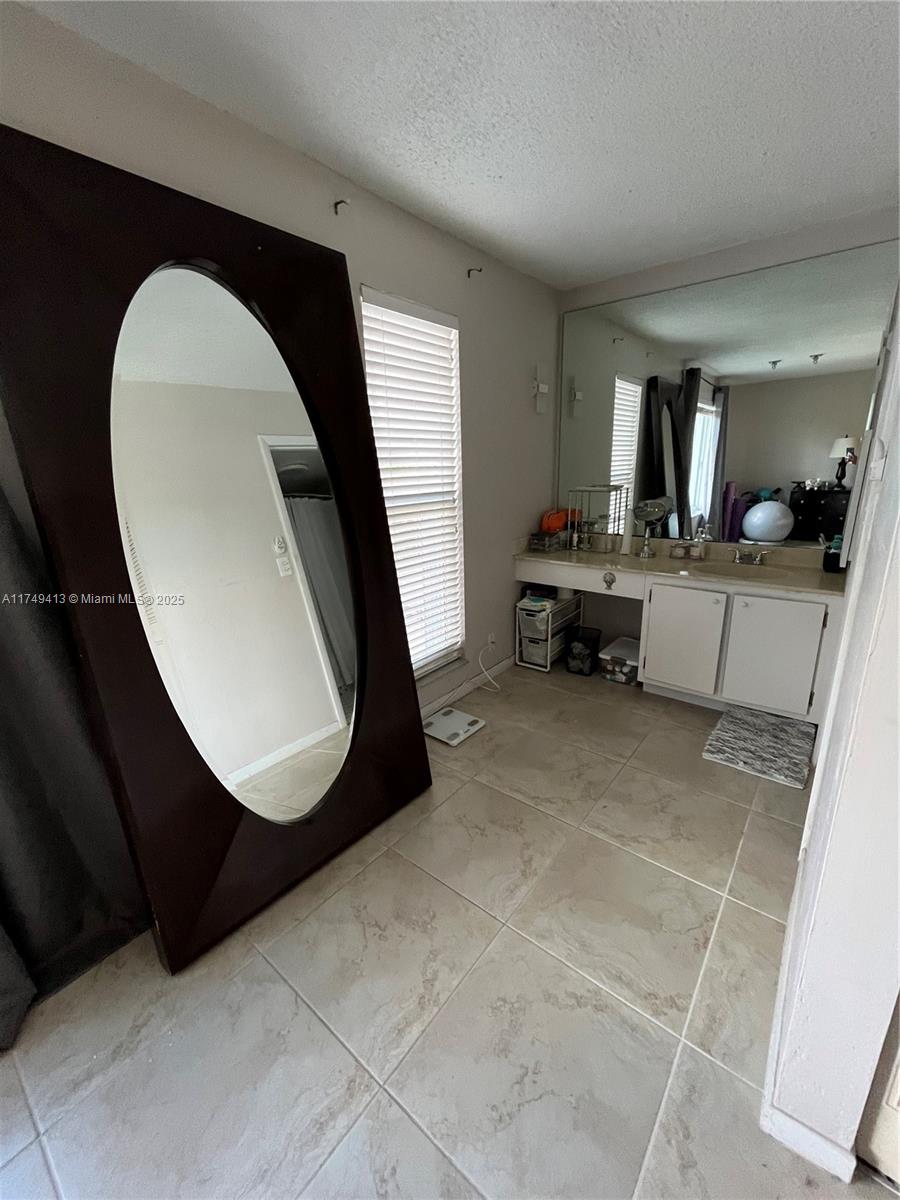3924 Southwest 67th Terrace, Unit 117 Davie, FL 33314 - Photo 14 of 18 a view of living room and kitchen