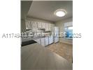 3924 Southwest 67th Terrace, Unit 117 Davie, FL 33314 - Photo 5 of 18 a view of a kitchen and a sink