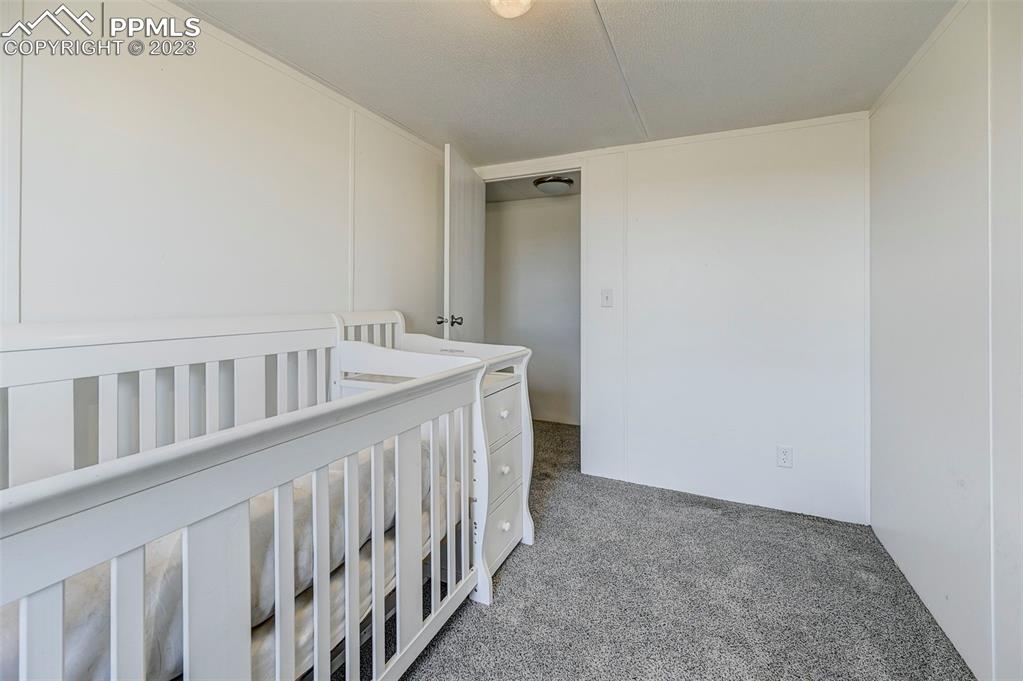 35525 Fossinger Road Yoder, CO 80864 - Photo 21 of 38 a view of hallway with wooden floor