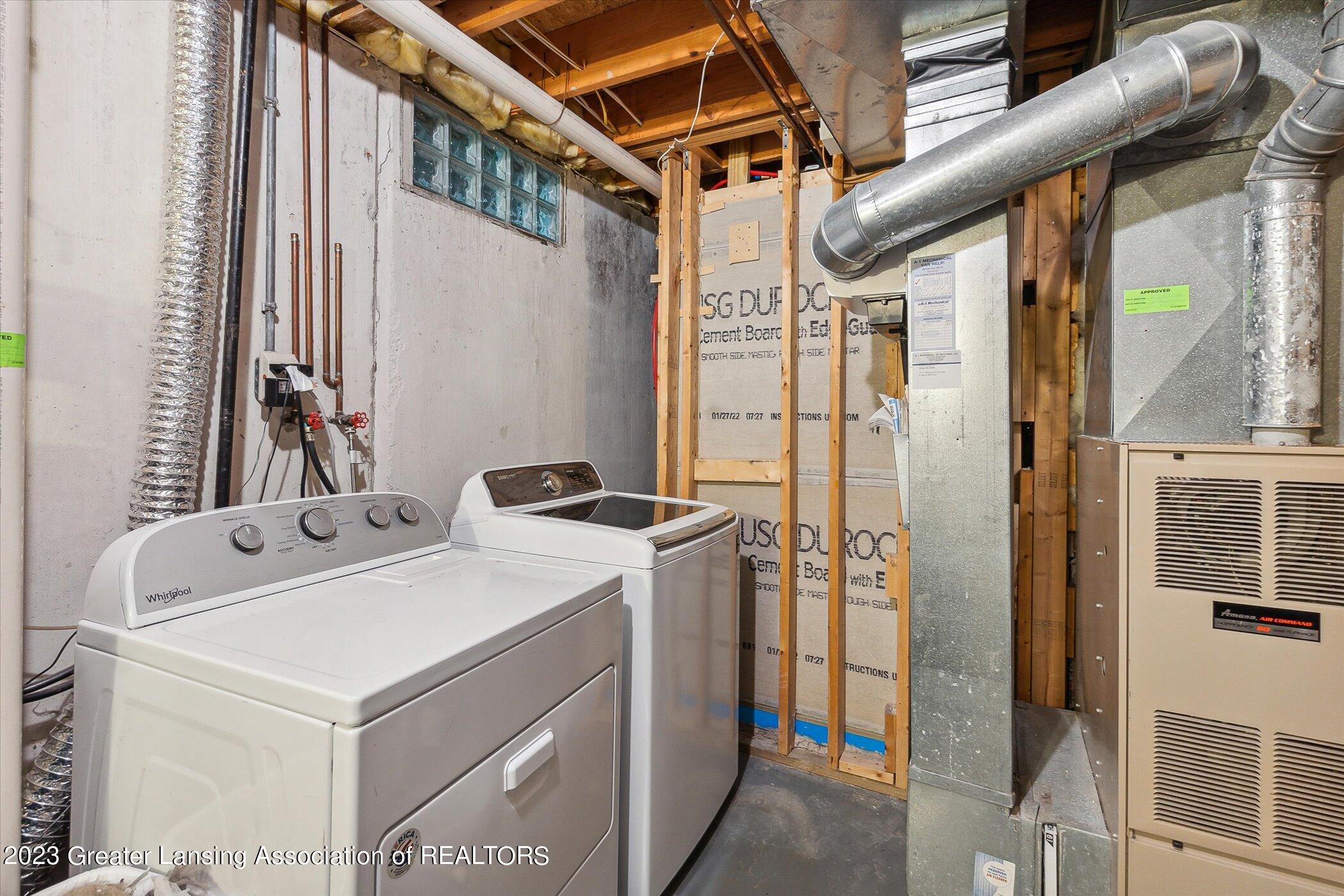 5151 Sleight Road Bath, MI 48808 - Photo 35 of 56 Furnace and laundry room