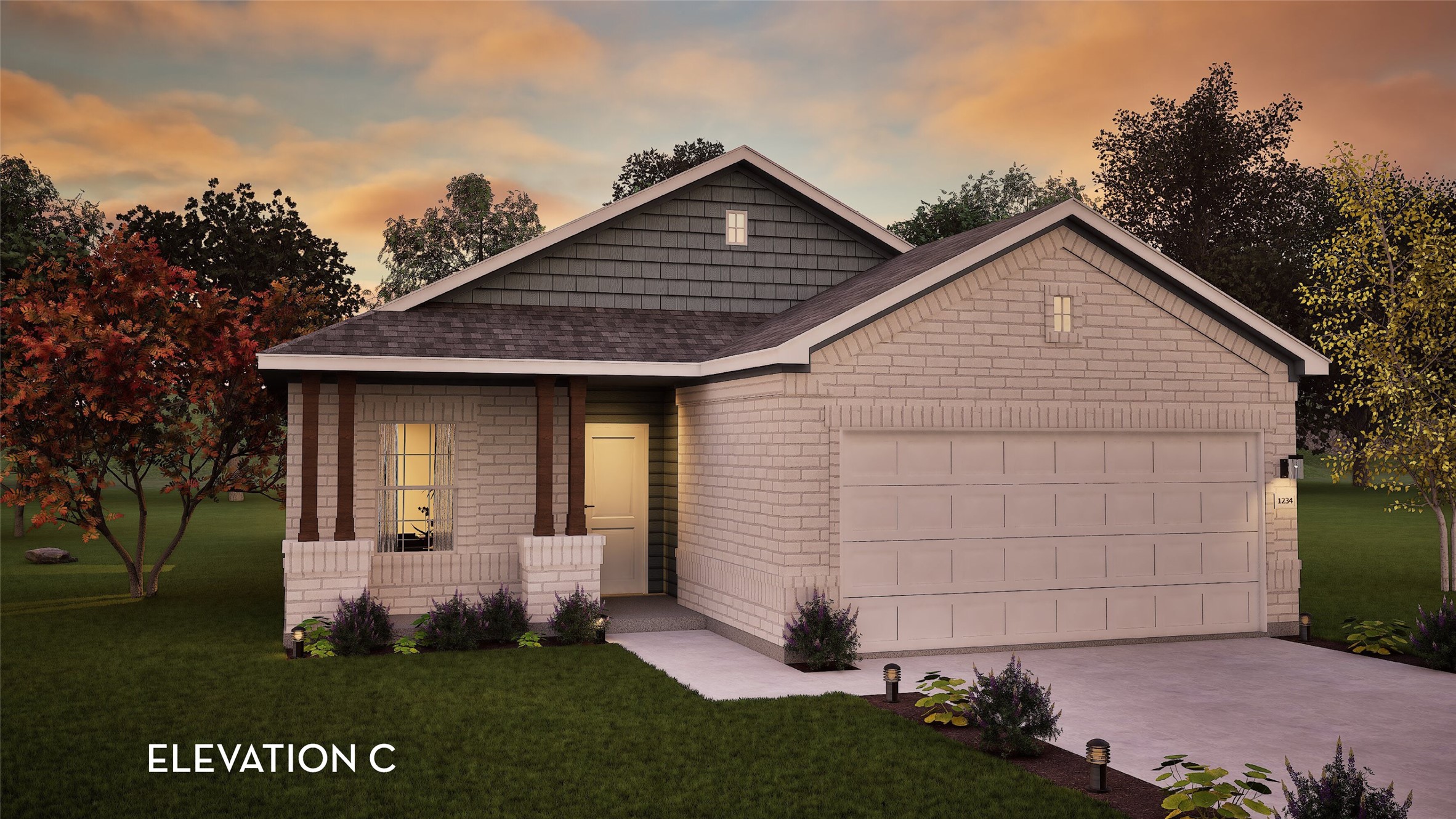 a front view of a house with a garden