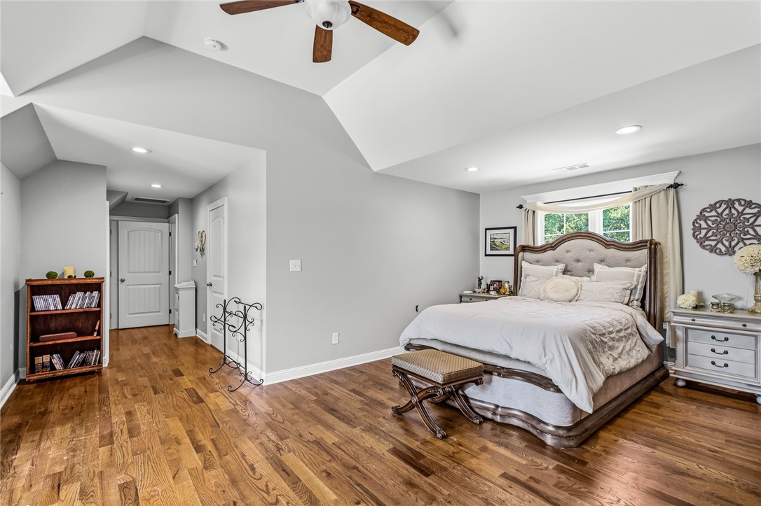 206 James Hare Road Anderson, SC 29626 - Photo 21 of 50 Rich hardwood floors complement the spacious sleeping area with vaulted ceilings and ample natural light.