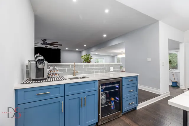 a kitchen with a stove and a sink