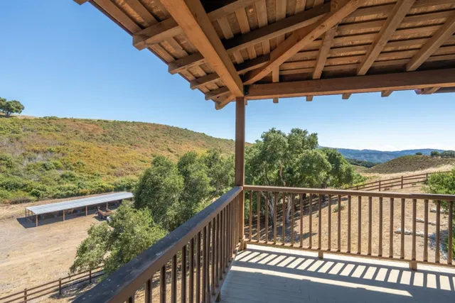 a view of a balcony with an outdoor space