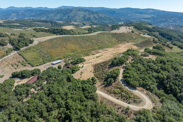 an aerial view of mountain with outdoor space