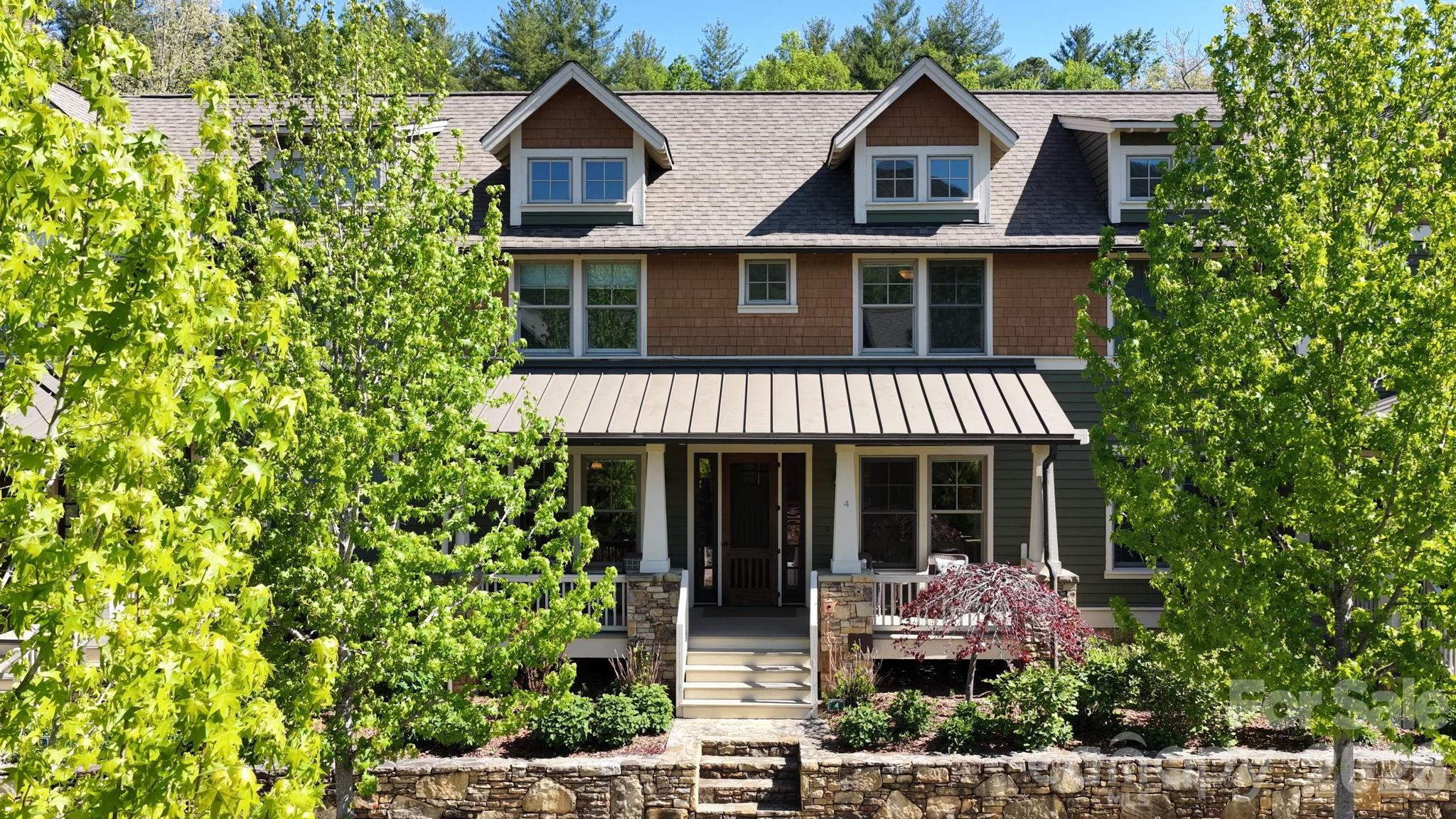 front view of a house with a yard