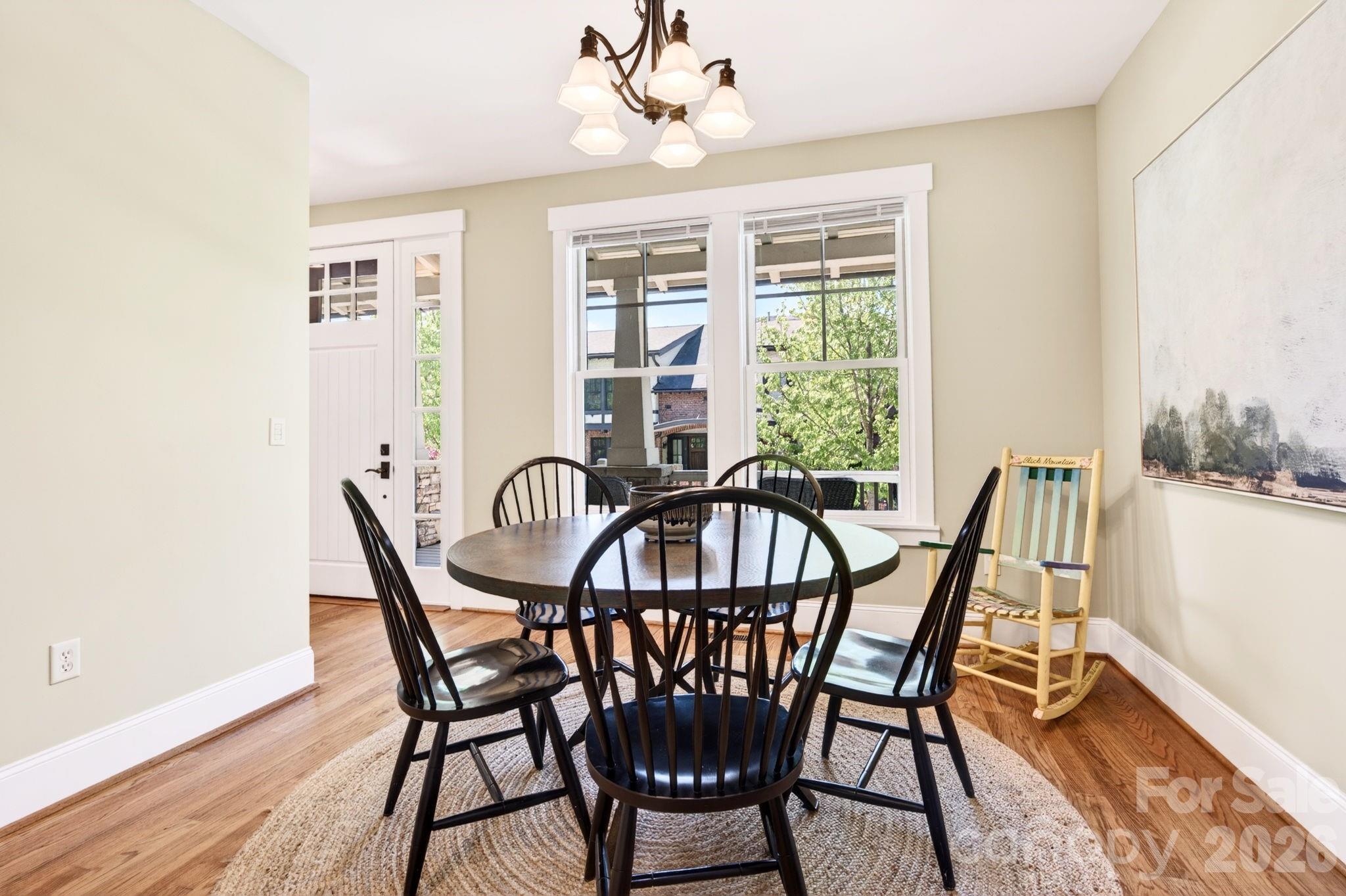 4 Fitzgerald Road Black Mountain, NC 28711 - Photo 12 of 43 a view of a dining room with furniture window and wooden floor