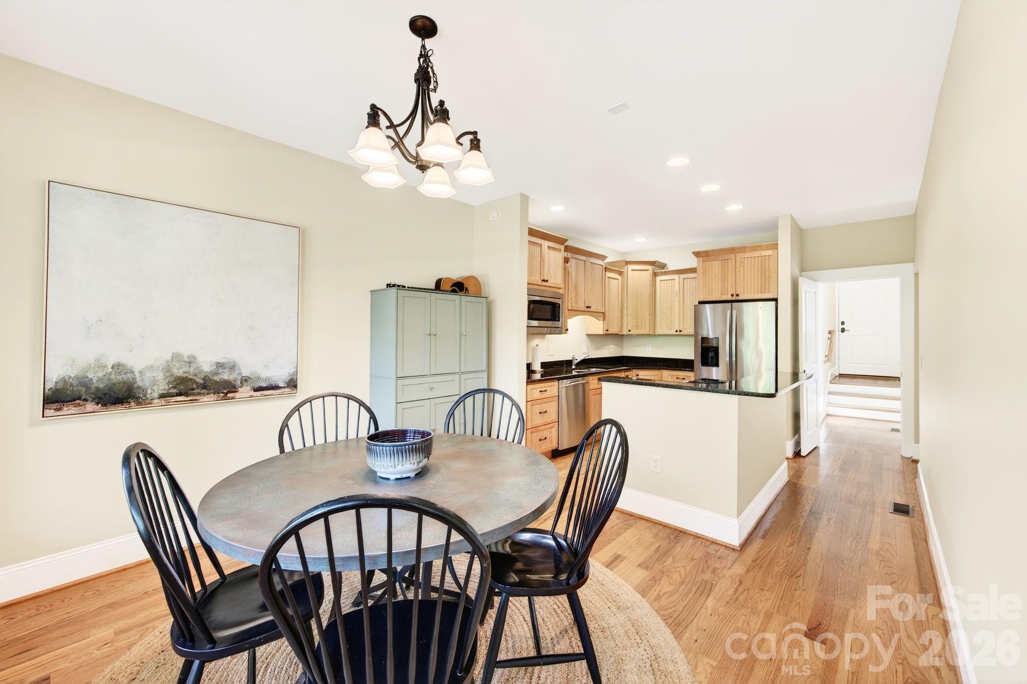 4 Fitzgerald Road Black Mountain, NC 28711 - Photo 13 of 43 a view of a dining room with furniture and a chandelier