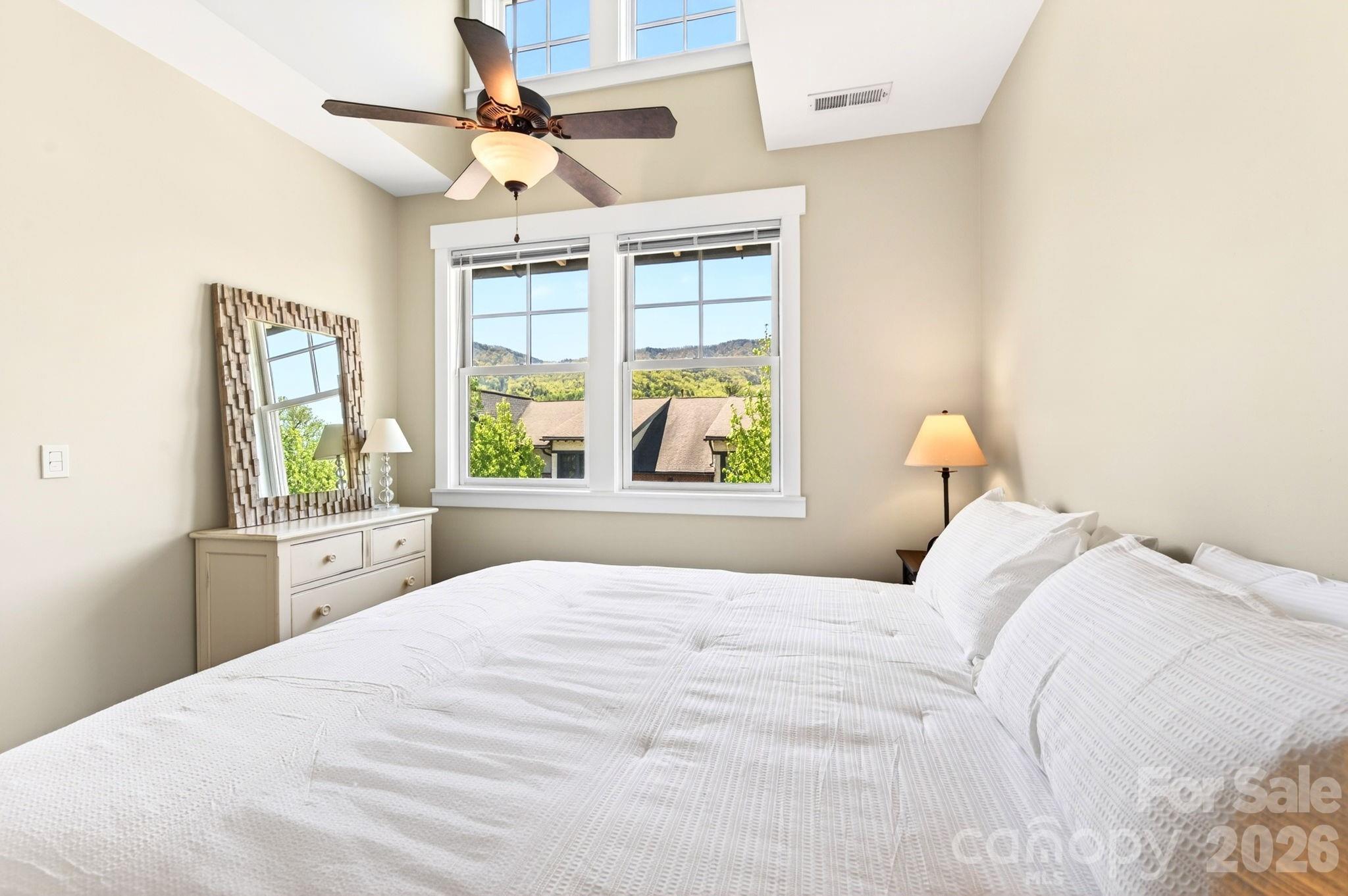 4 Fitzgerald Road Black Mountain, NC 28711 - Photo 19 of 43 a bedroom with a large bed and a window