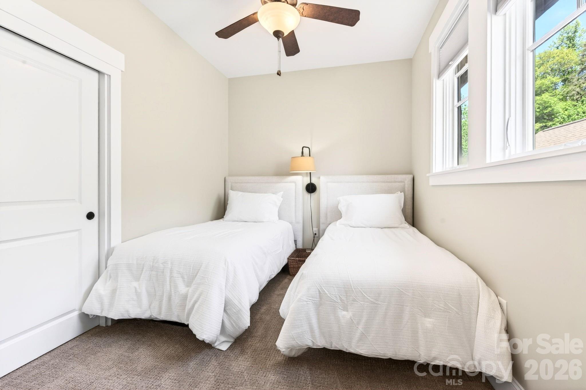 4 Fitzgerald Road Black Mountain, NC 28711 - Photo 21 of 43 a bedroom with a bed and window