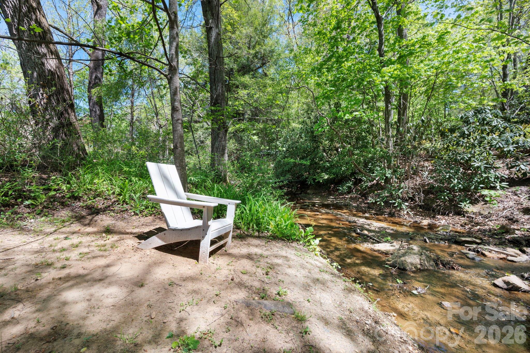 4 Fitzgerald Road Black Mountain, NC 28711 - Photo 29 of 43 a view of a bench in a backyard
