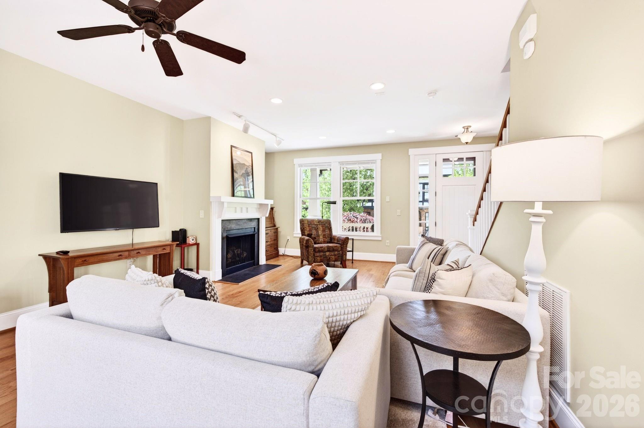 4 Fitzgerald Road Black Mountain, NC 28711 - Photo 6 of 43 a living room with furniture fireplace and a flat screen tv