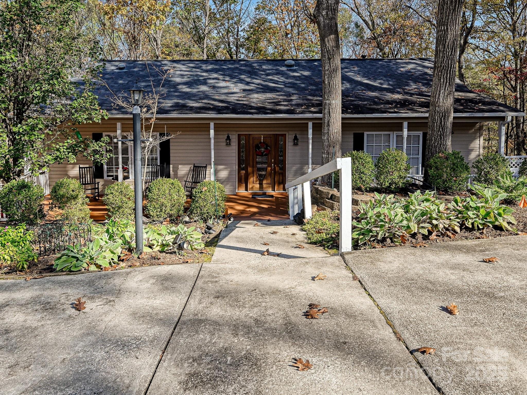 25040 Timberlake Drive Tega Cay, SC 29708 - Photo 2 of 40 front view of house with a small yard