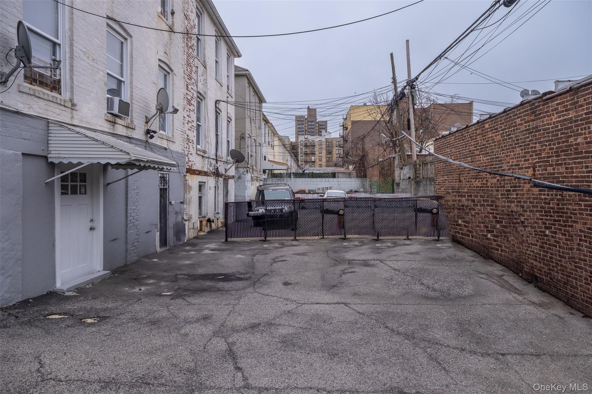 2541 Holland Avenue Bronx, NY 10467 - Photo 12 of 16 a view of a street with buildings
