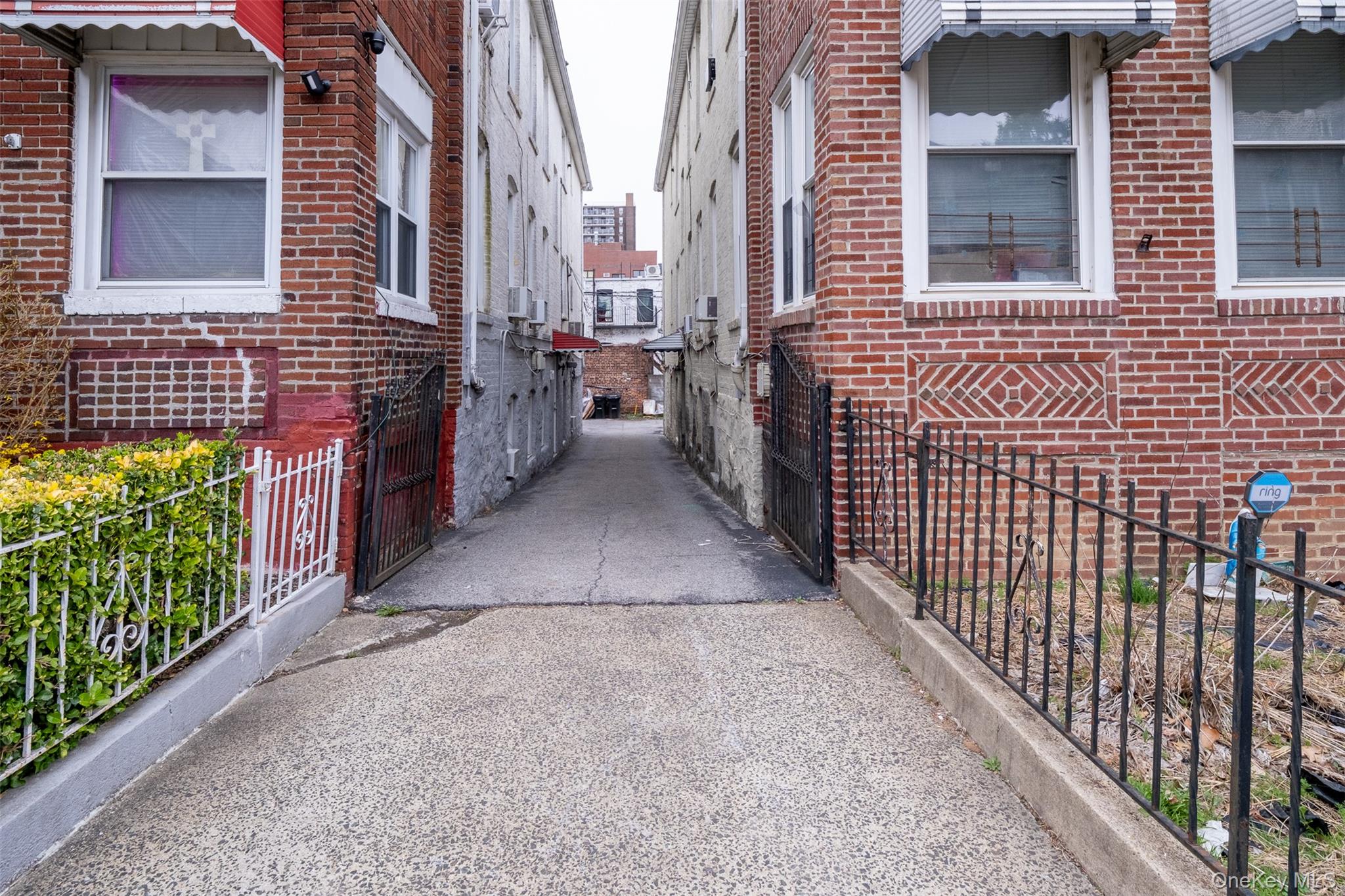 2541 Holland Avenue Bronx, NY 10467 - Photo 2 of 16 a view of a pathway both side of building