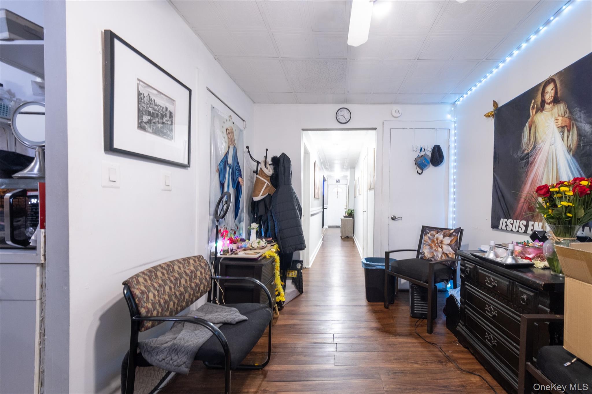 2541 Holland Avenue Bronx, NY 10467 - Photo 5 of 16 a living room with furniture and a flat screen tv
