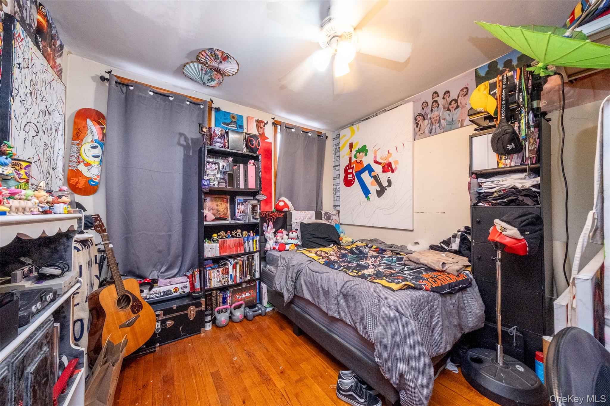 2541 Holland Avenue Bronx, NY 10467 - Photo 9 of 16 a bed room with a bed and a couch