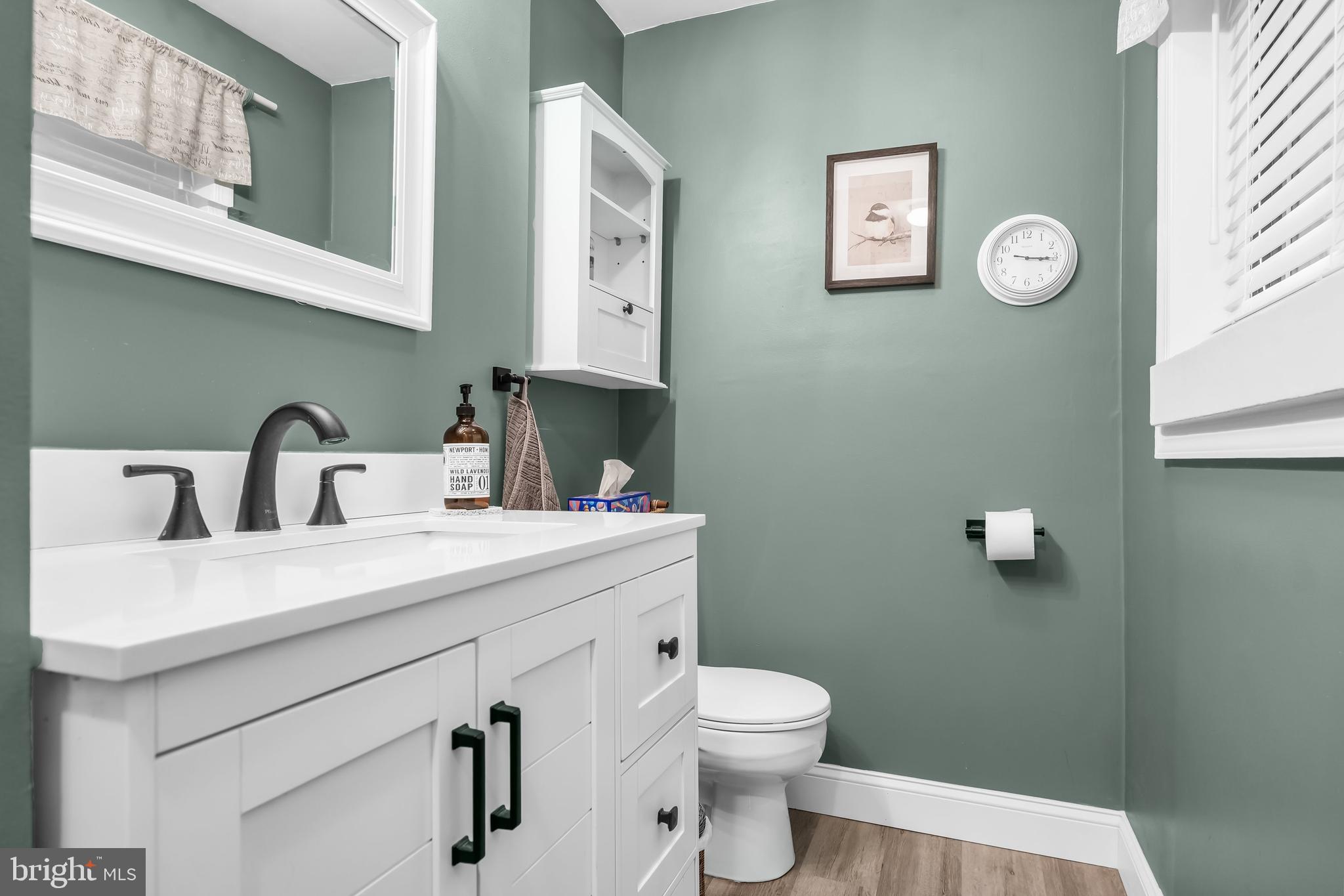 50 Brighton Road Westampton, NJ 08060 - Photo 27 of 35 a bathroom with a toilet sink and mirror