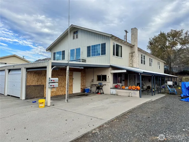 a view of a street with cars
