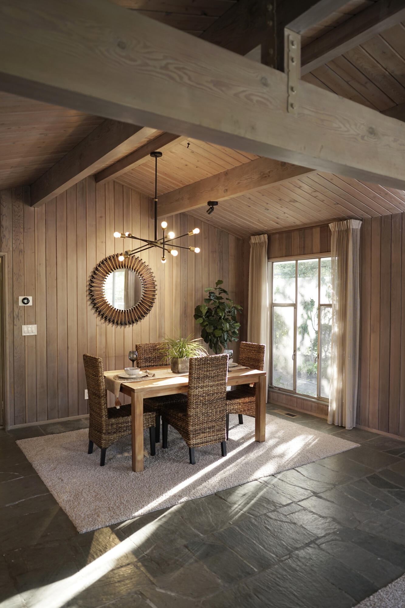 939 Mission Ridge Road Santa Barbara, CA 93103 - Photo 13 of 24 a view of a dining room with furniture window and wooden floor