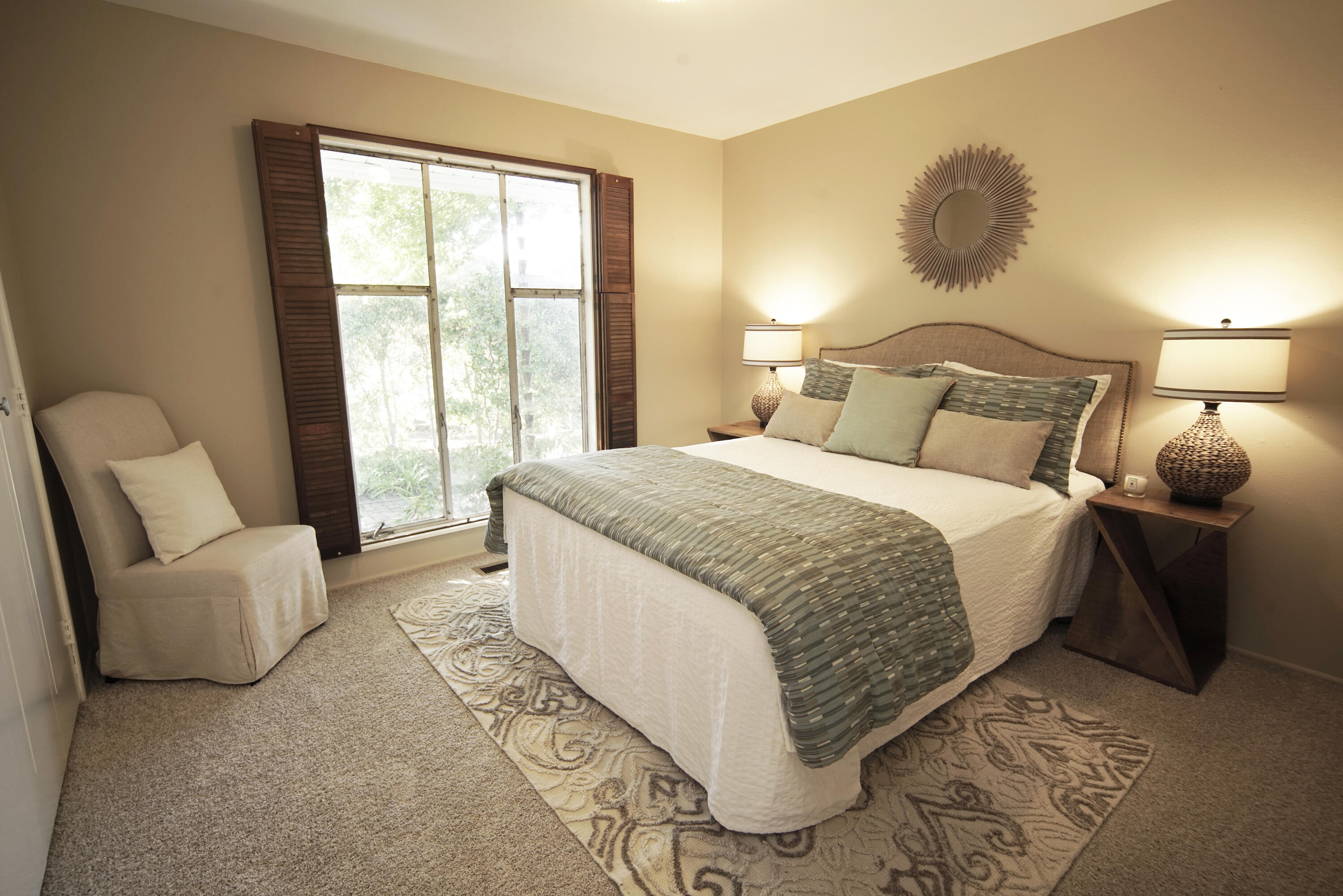 939 Mission Ridge Road Santa Barbara, CA 93103 - Photo 15 of 24 a bedroom with a bed and a couch