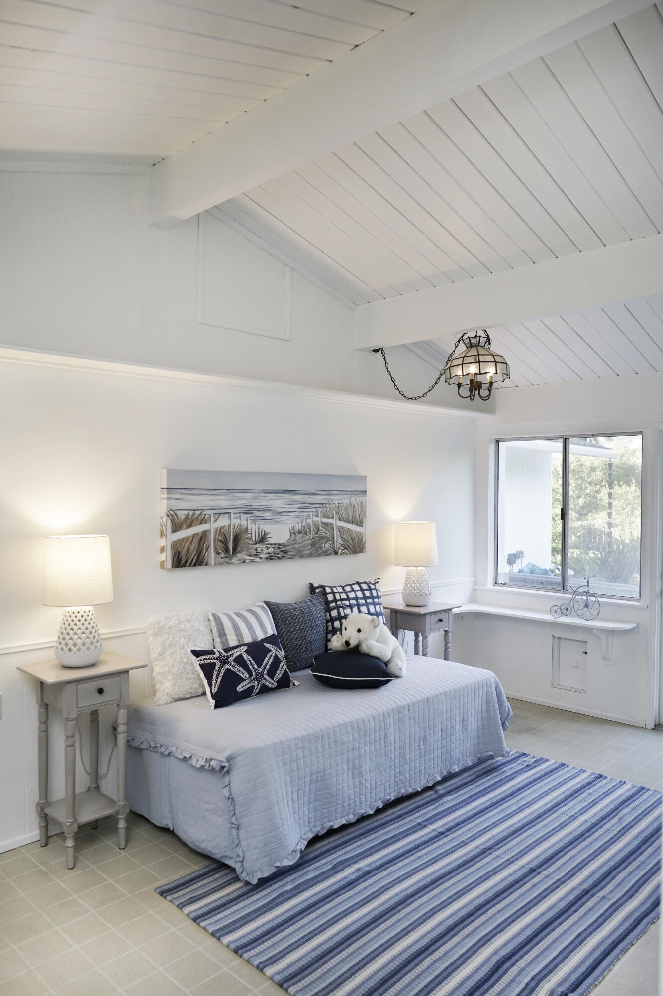 939 Mission Ridge Road Santa Barbara, CA 93103 - Photo 16 of 24 a bedroom with a bed and window