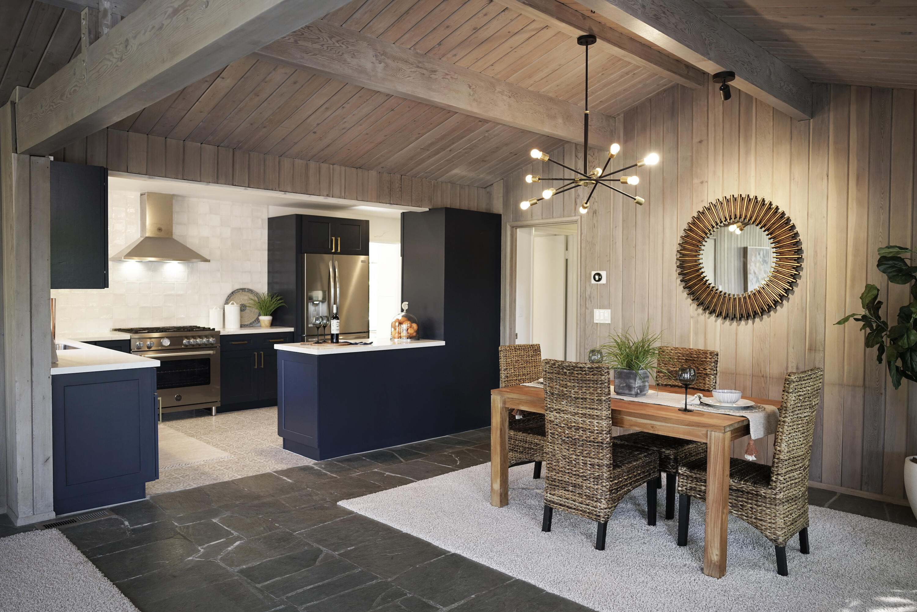 939 Mission Ridge Road Santa Barbara, CA 93103 - Photo 4 of 24 a living room with a couch and a kitchen view