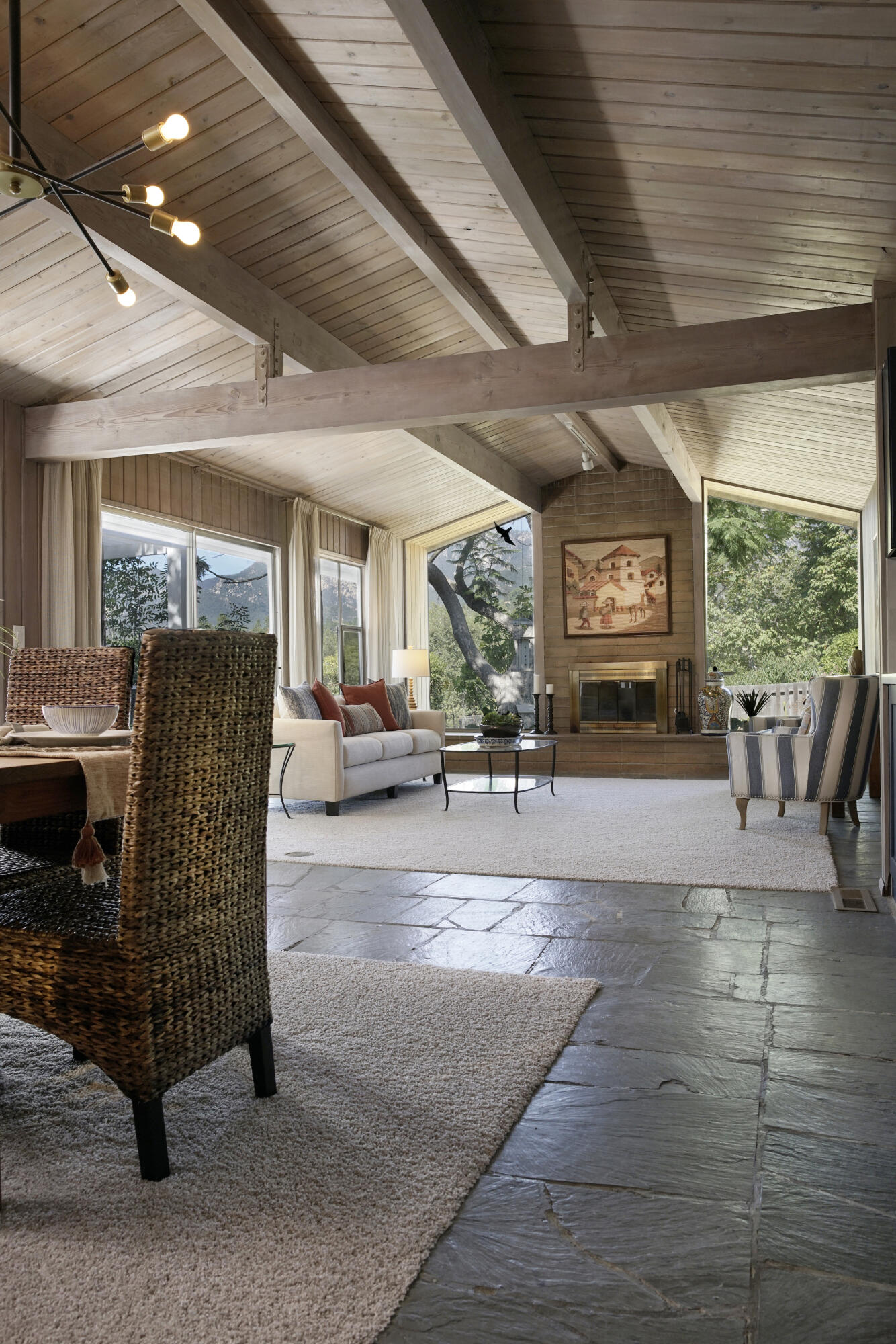939 Mission Ridge Road Santa Barbara, CA 93103 - Photo 6 of 24 a living room with furniture a garden view and a large window