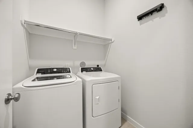 a kitchen with granite countertop a sink and cabinets