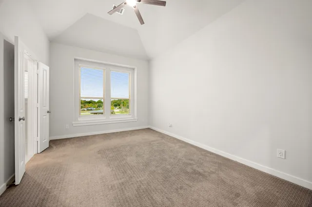 a view of a lake with a big yard