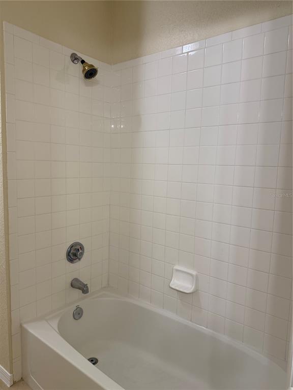 3725 Conroy Road, Unit 2127 Orlando, FL 32839 - Photo 29 of 30 a bathroom with a bathtub