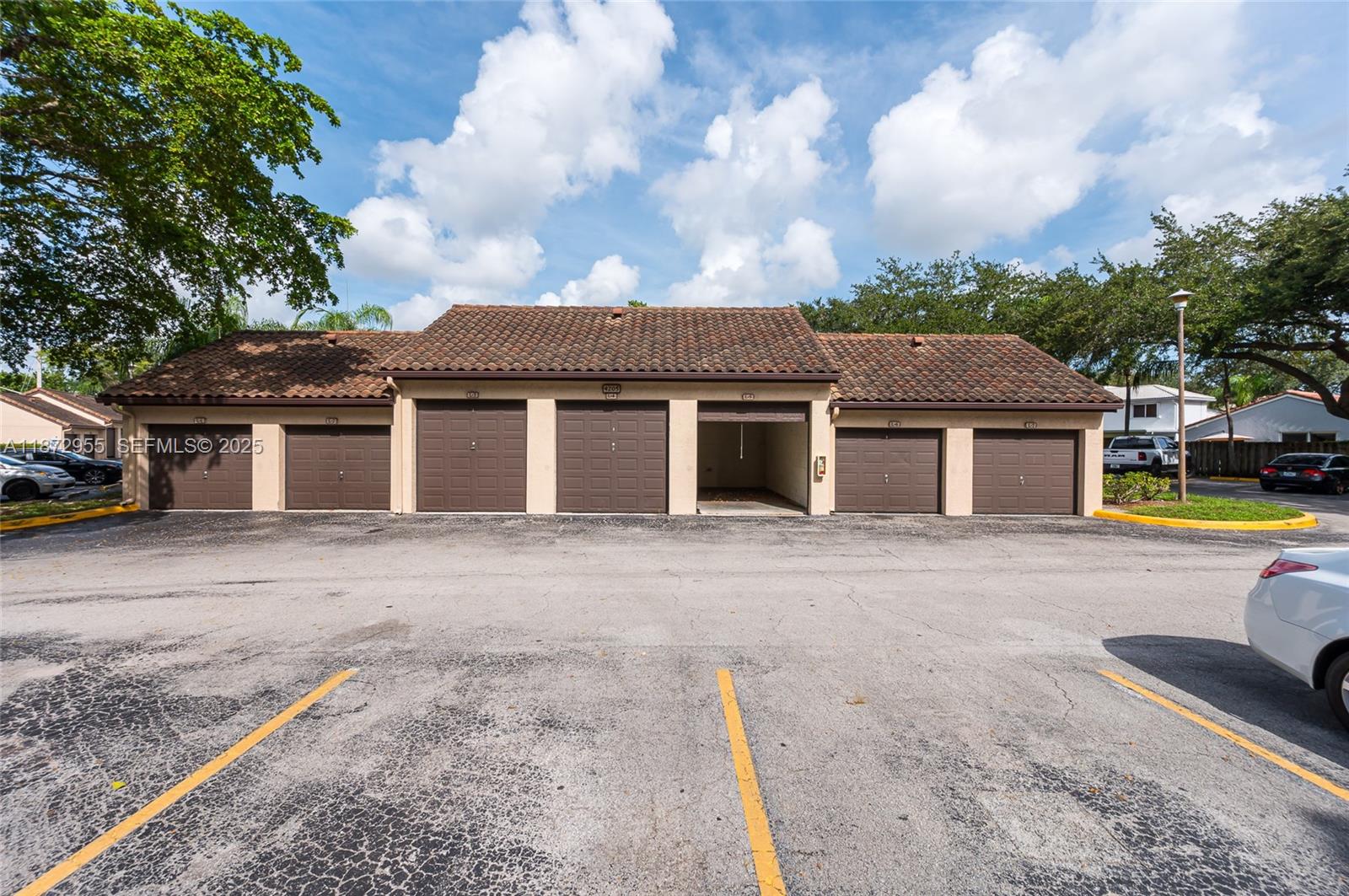 4201 West McNab Road, Unit 27 Pompano Beach, FL 33069 - Photo 6 of 15 a view of a house with a outdoor space