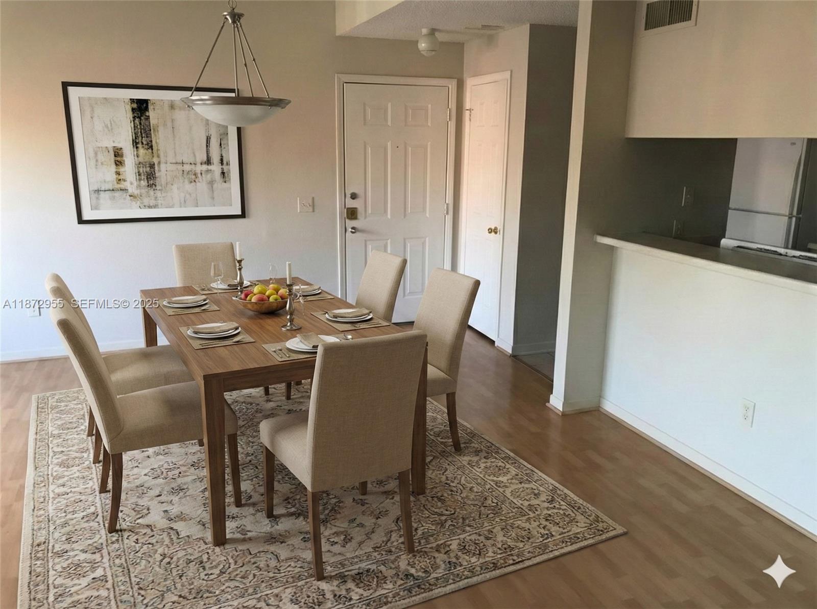 4201 West McNab Road, Unit 27 Pompano Beach, FL 33069 - Photo 10 of 15 a view of a dining room with furniture