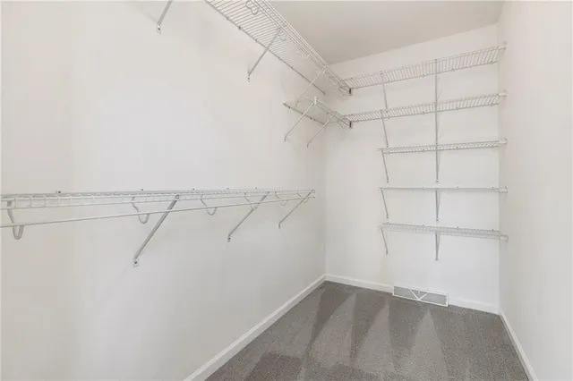 a view of a room with racks on the wall