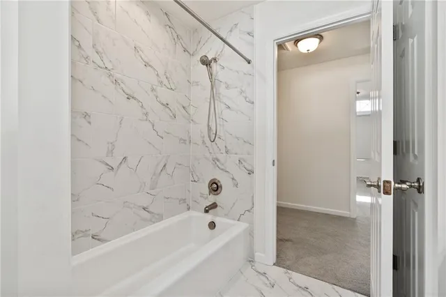 a bathroom with a bathtub