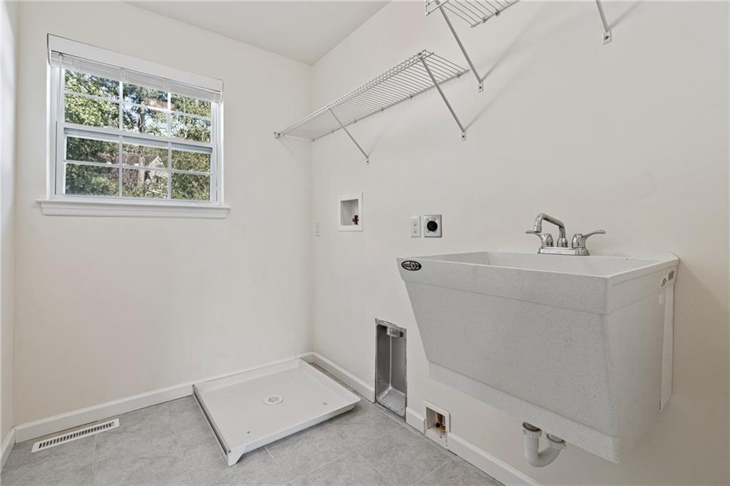 203 Southview Road Pittsburgh, PA 15237 - Photo 24 of 34 a bathroom with a sink and a window