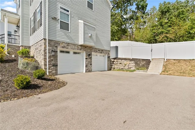 a view of a street with a house