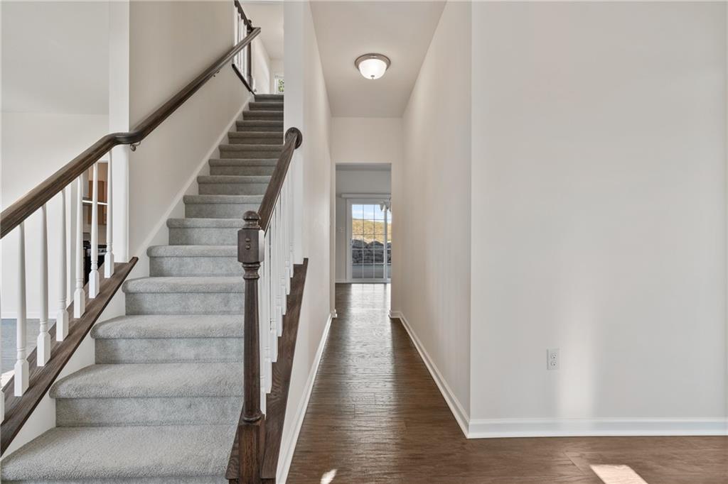 203 Southview Road Pittsburgh, PA 15237 - Photo 4 of 34 a view of staircase with wooden floor and white walls