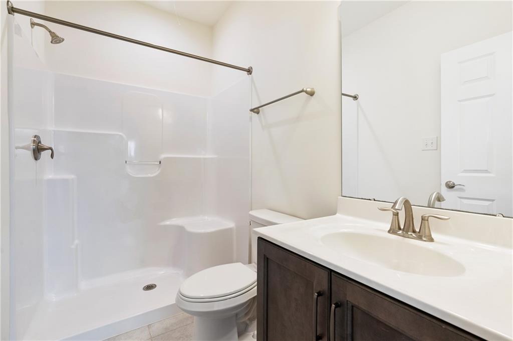 203 Southview Road Pittsburgh, PA 15237 - Photo 10 of 34 a bathroom with a sink a toilet and shower