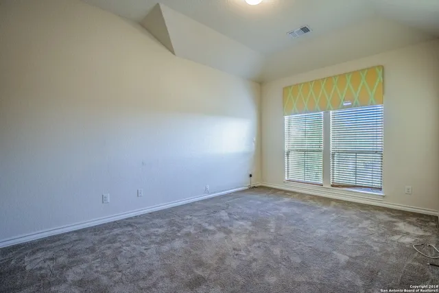 an empty room with a window