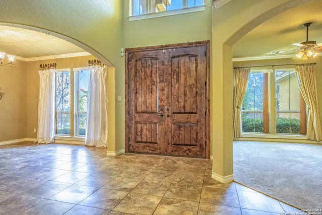 a view of entryway with a front door